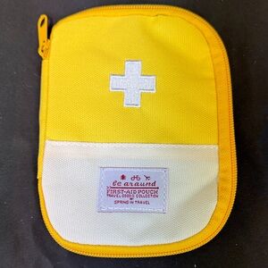 Yellow and White First-Aid Pouch